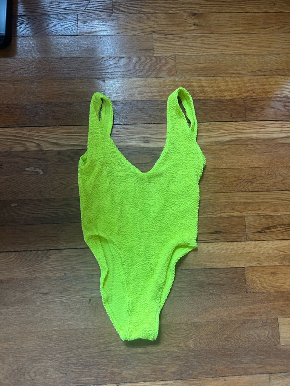 Bond-eye swimsuit. Bright yellow. One size fits all. Never worn.